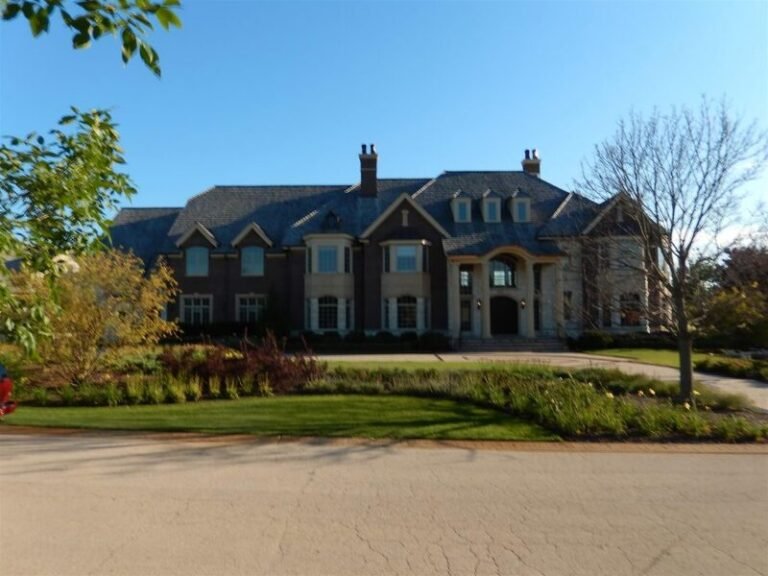 Cedar shake roof on a large estate home, installed by Adept Construction