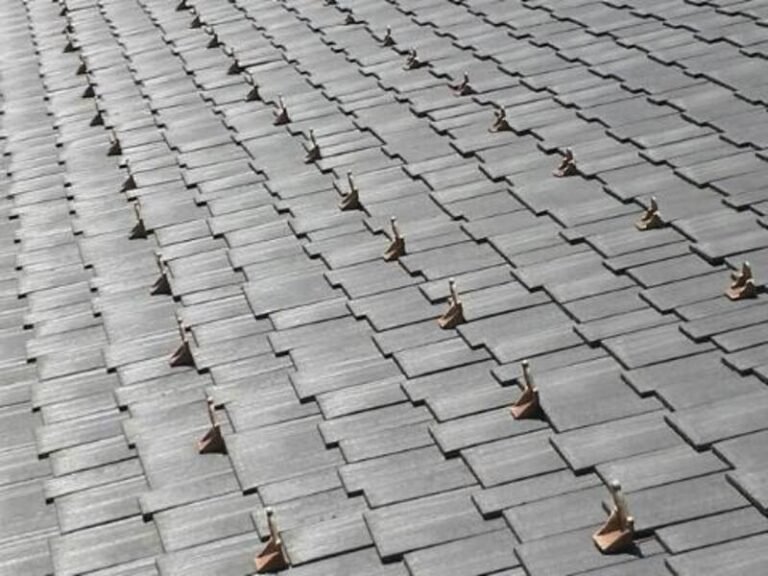 Close-up of composite shake roofing, installed by Adept Construction