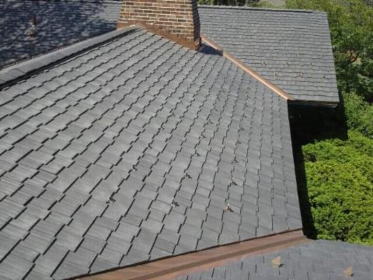 Composite shingle roof section, installed by Adept Construction