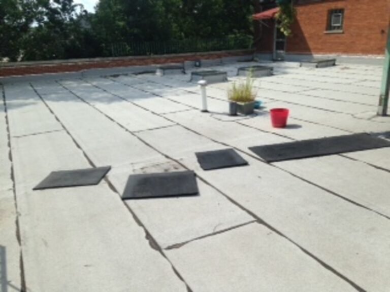 Flat roof membrane with new roof hatches, installed by Adept Construction