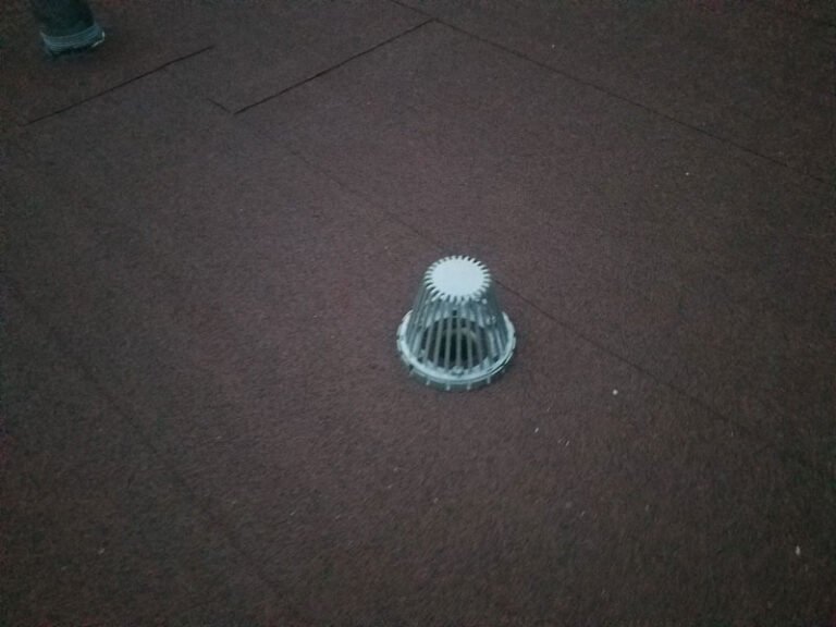 New pipe flashing on a flat roof, by Adept Construction