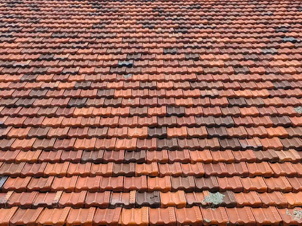 replacing a broken roof tile