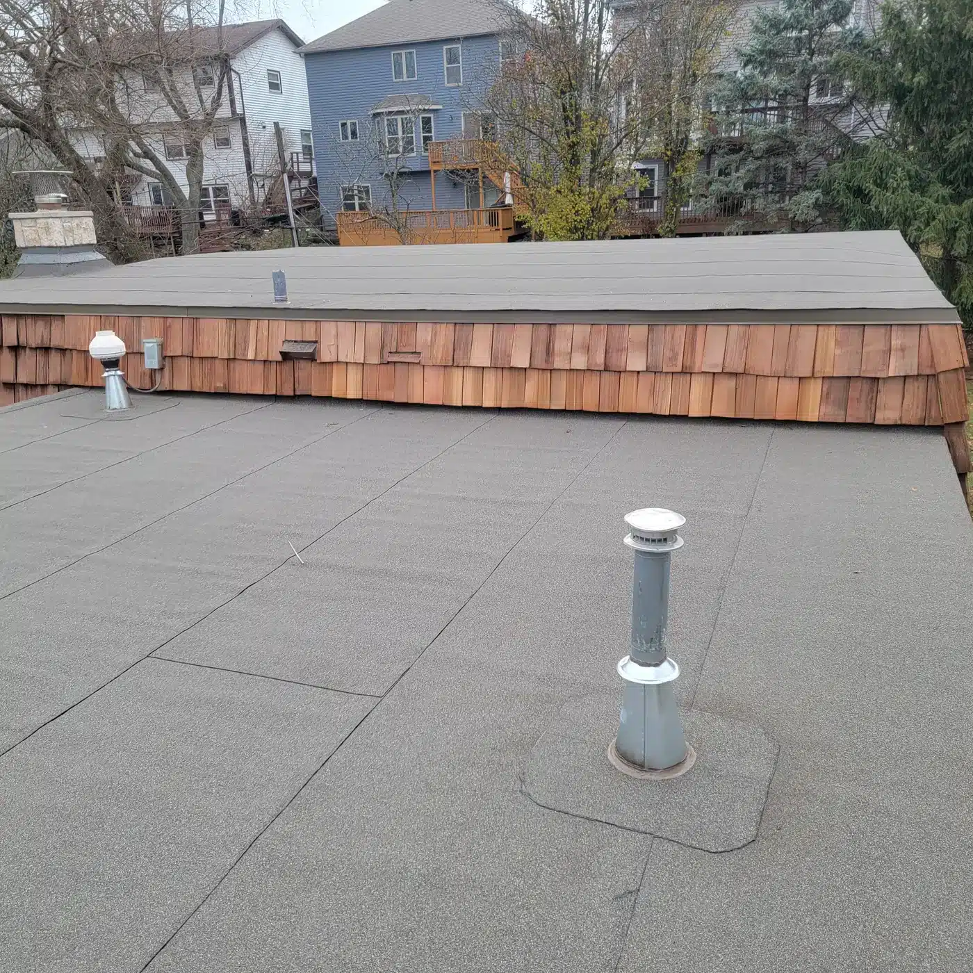 New flat roof with a vent pipe on a Glen Ellyn, IL home