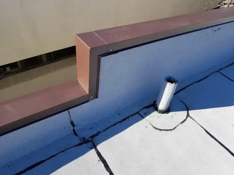 Flat roof membrane and parapet flashing on a commercial building in Naperville, IL