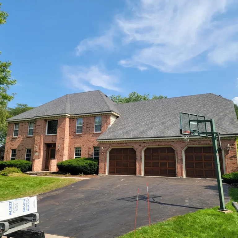 Architectural asphalt shingle roof on a brick home in Naperville, IL