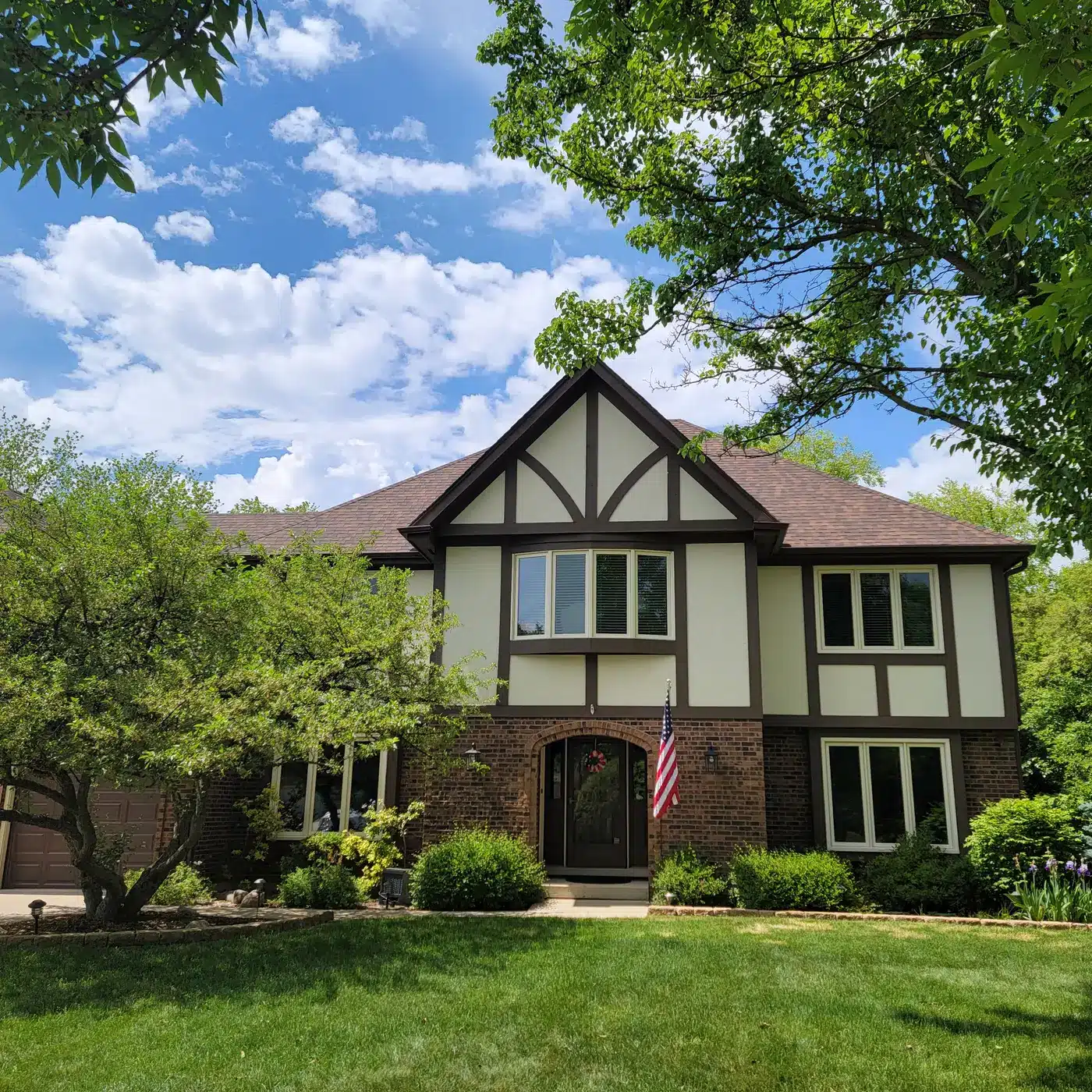New CertainTeed Landmark Pro roof in Burnt Sienna on a Tudor-style home in Naperville, Illinois