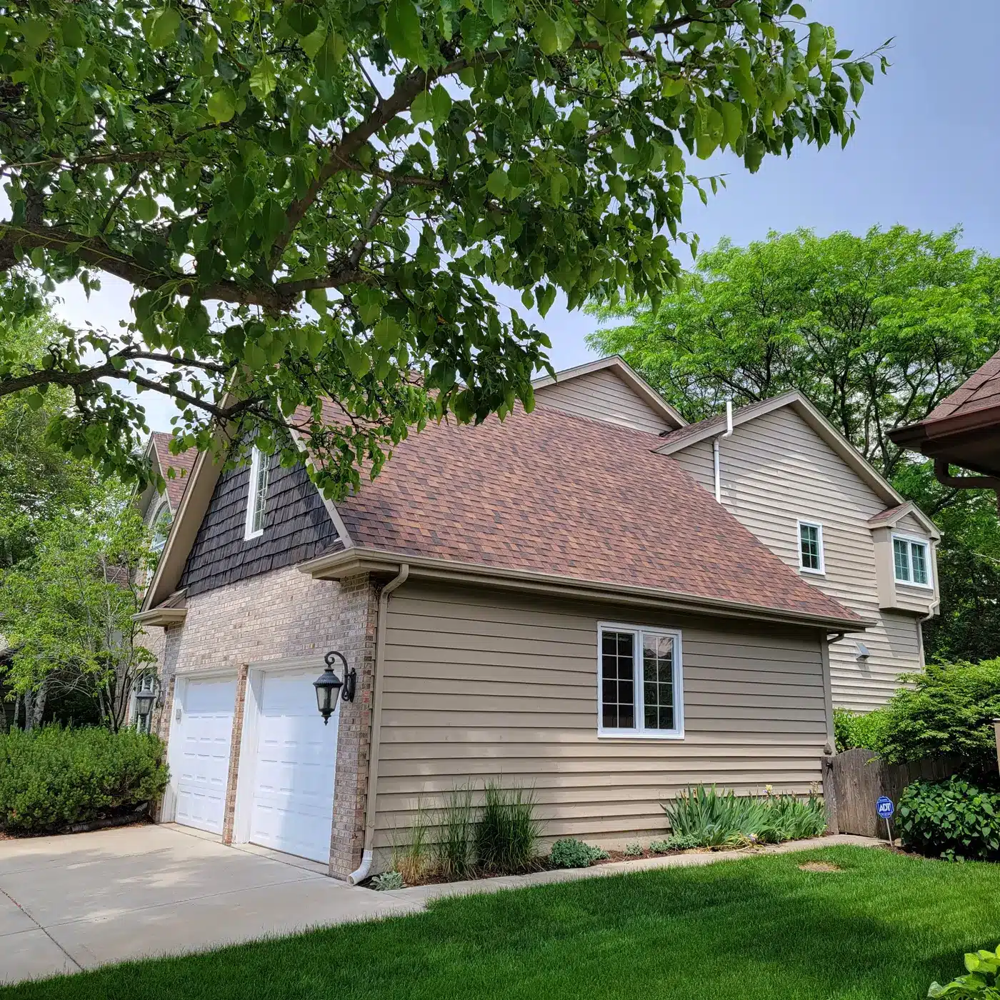 Adept Construction roof and gutters on a Naperville, IL home