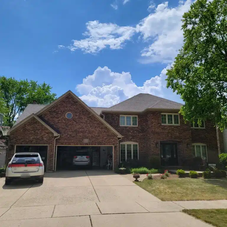 Brick home in Naperville, IL with a new Weathered Wood shingle roof